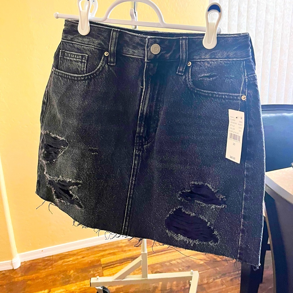 Pacsun black ripped jean skirt with pockets in back